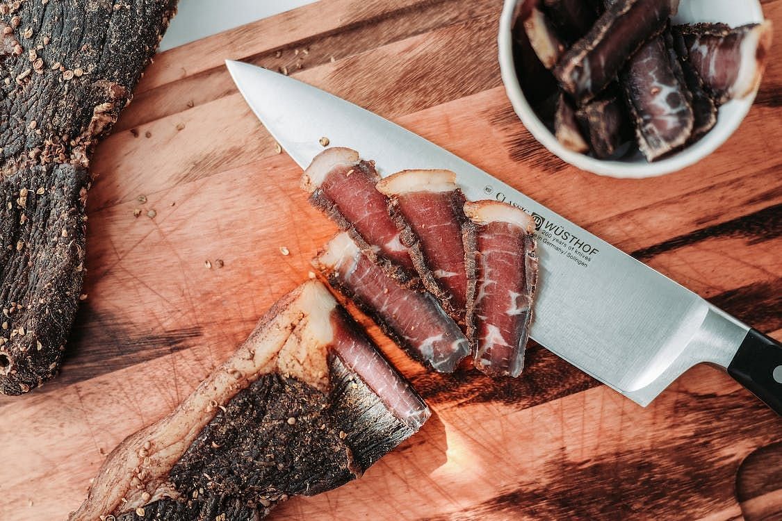 Beef jerky high in protein, up to 13 grams per serving. (Image via Pexels/Jeff Siepson)